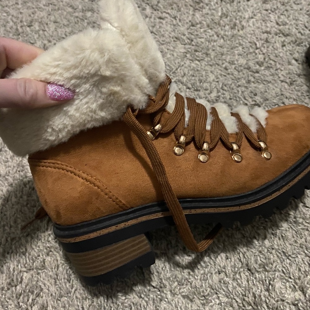 Women’s fur snow boots.  Size 6. New, never worn.